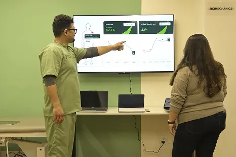 doctor-helping-patient-rehabilitation